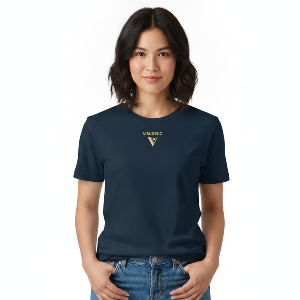 A woman wearing a navy blue short-sleeve t-shirt with a small gold 'VISUDECO' logo and 'V' emblem on the left chest, paired with blue jeans, against a plain white background.