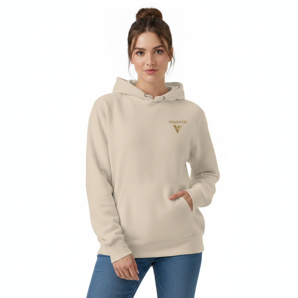 Woman wearing a hoodie in desert dust with logo in front.