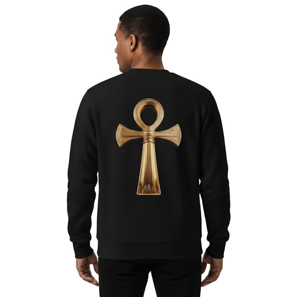 Black sweatshirt with a gold ankh symbol on the back, worn by a person.
