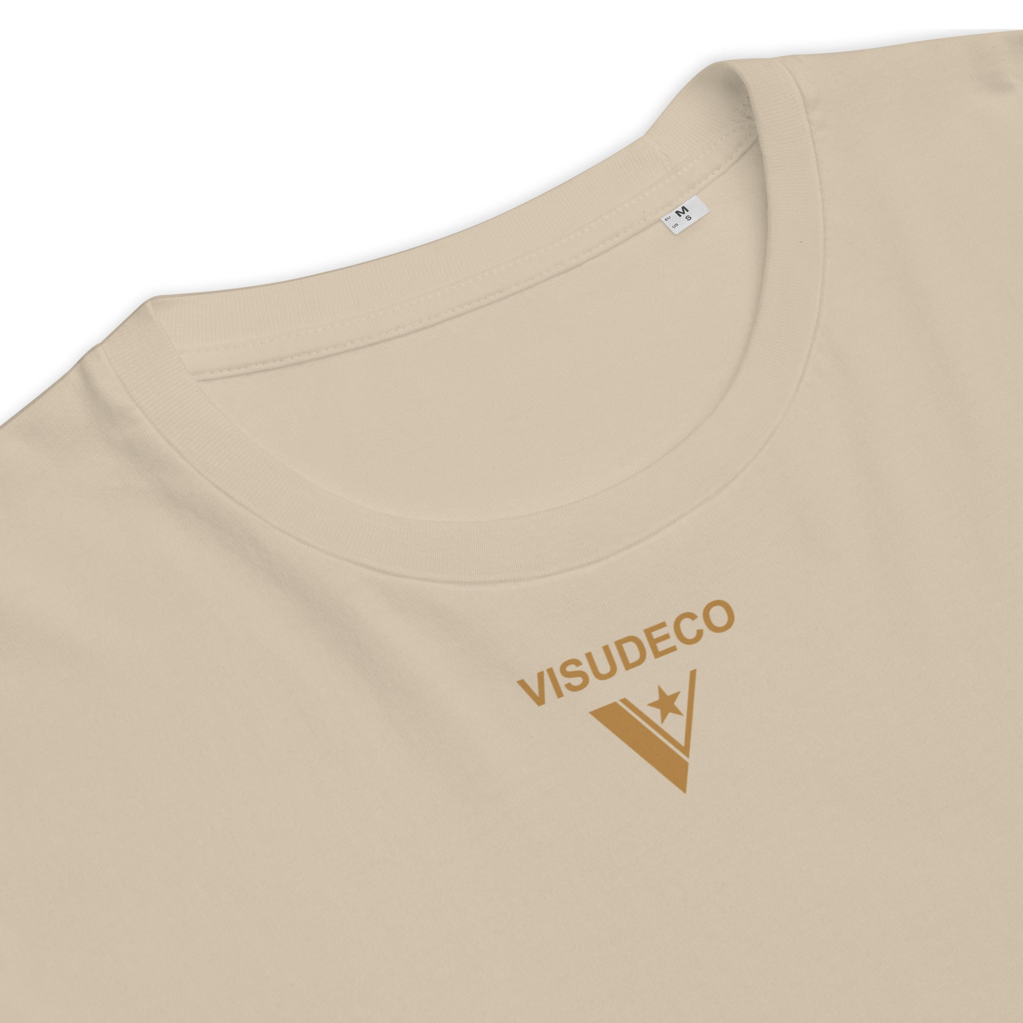 Organic Cotton T-Shirt in Desert Dust close up of neckline and visudeco logo.