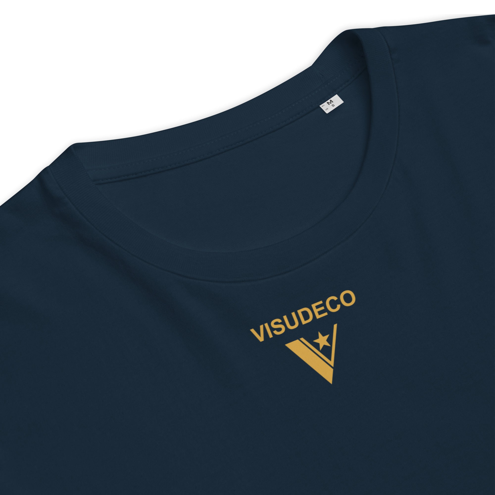 Organic cotton t-shirt in navy blue close up of round neckline with visudeco logo.