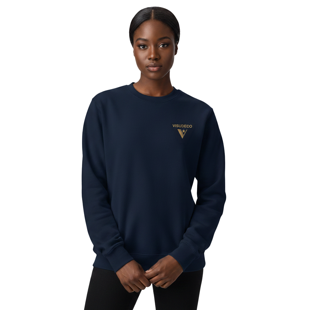 Person wearing a navy blue sweatshirt with a logo on a white background