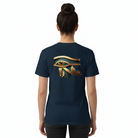 Person wearing a navy blue t-shirt with a golden design on the back, against a white background