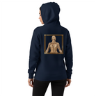 Person wearing a navy hoodie with the design of a golden woman on the back against a white background.