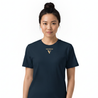 Woman wearing a navy blue t-shirt with a logo on a white background