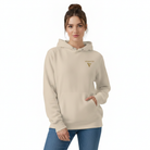 Woman wearing a hoodie in desert dust with logo in front.