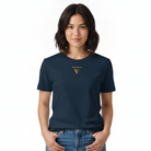 Woman wearing navy blue t-shirt with logo on the front.