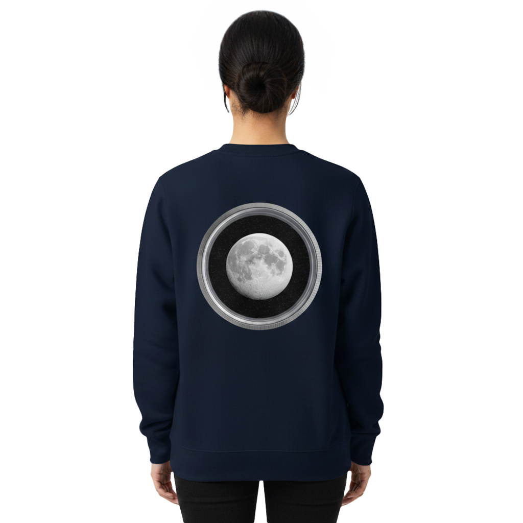 Person wearing a navy blue sweatshirt with a moon design on the back against a white background