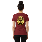 Woman wearing a burgundy t-shirt with a golden pharaoh design on the back.