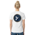 A woman viewed from the back wearing a white short-sleeve T-shirt with a large circular graphic on the back featuring a white dove in flight over a dark blue background with a metallic-looking border.