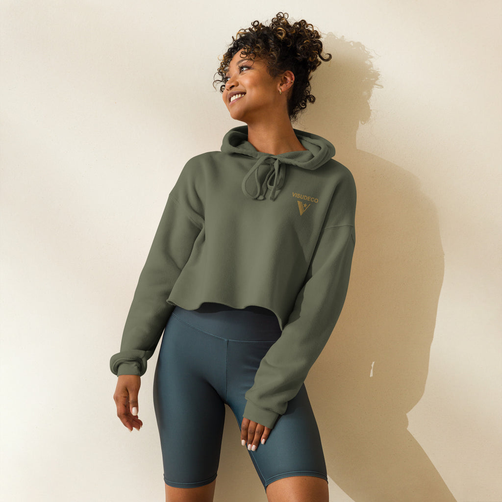 Women's Cropped Hoodie in Military Green on female model with logo embroidered on the front.